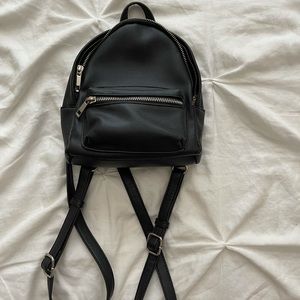Mini black back pack